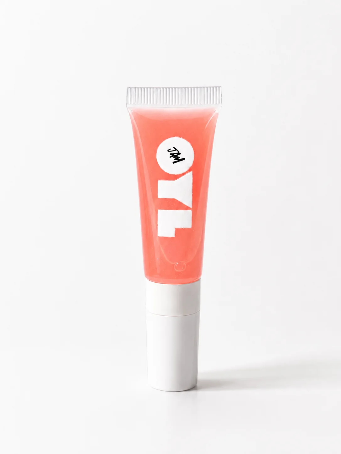 OylJam™ Lip Oil Top Coat standing upright in a warm guava tone